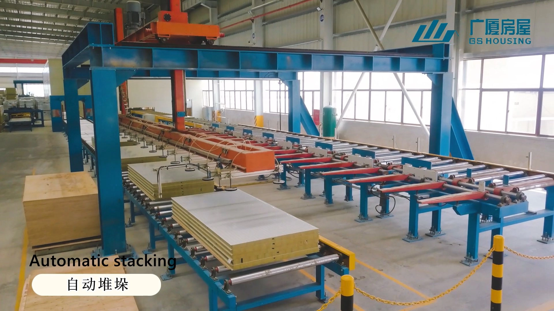 Automatic stacking container house system for efficient modular camp construction