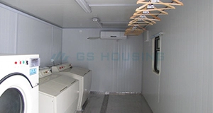 laundry room in container house with modular design for worker accommodation